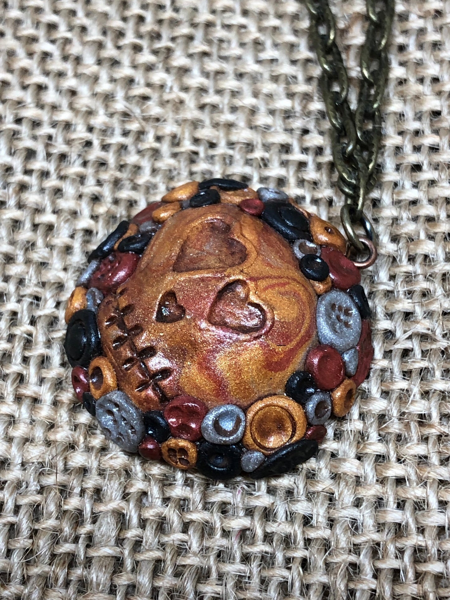 Adorned and Antiqued Skull Polymer Clay Pendant Necklace