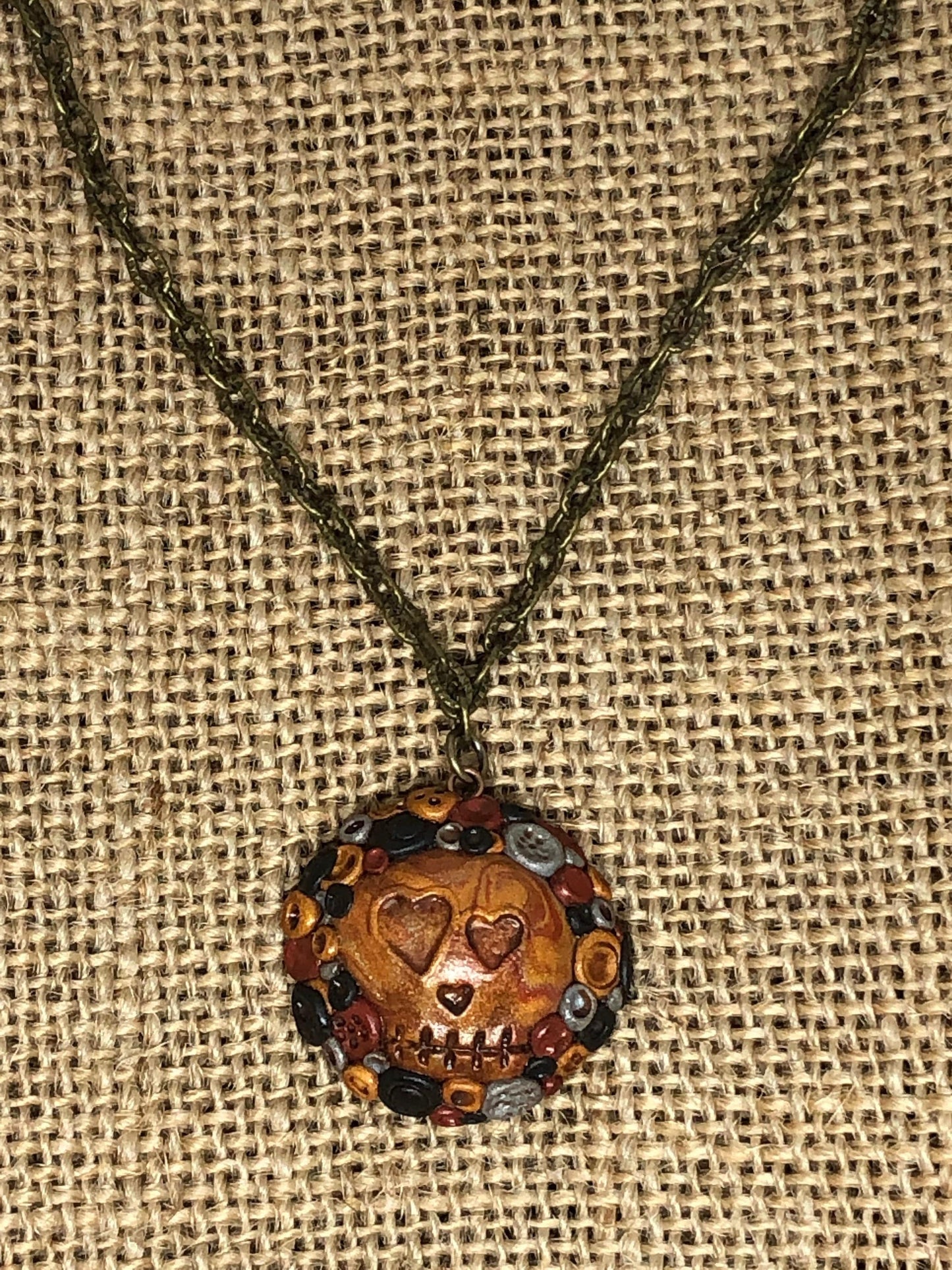 Adorned and Antiqued Skull Polymer Clay Pendant Necklace