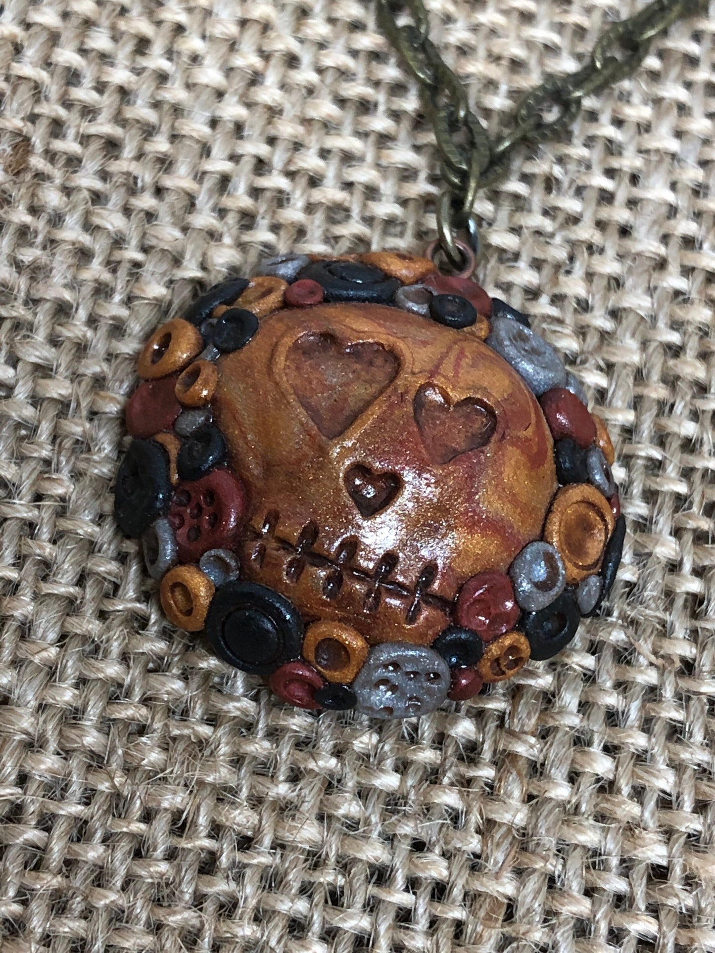 Adorned and Antiqued Skull Polymer Clay Pendant Necklace